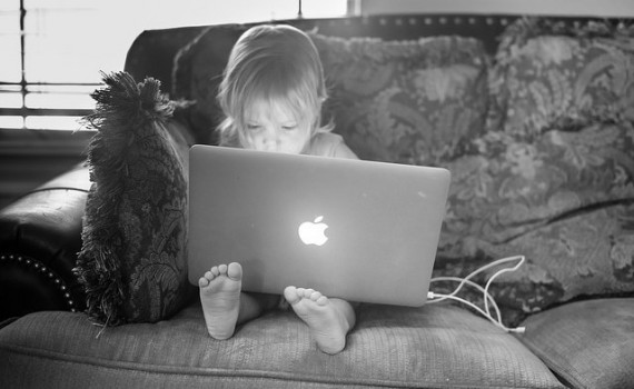 photo of toddler with laptop