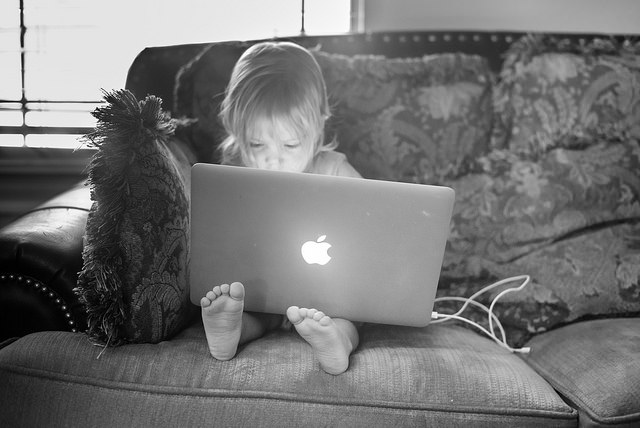 photo of toddler with laptop